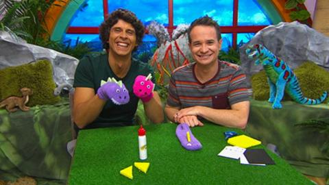 Andy and Alex making their dinosaur sock puppets