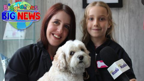 Erin and her mum Jen with a dog.