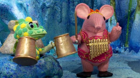 Tiny Clanger from The Clangers with her panpipes and the Soup Dragon holding tankards.