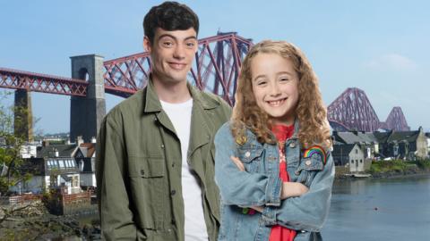 Molly and Mack from this show, standing in front of the town of North Queensferry