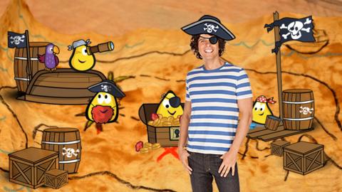 Andy from Pirate Andy's Adventure in front of CBeebies bugs dressed as pirates on a treasure map.