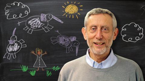 Michael Rosen from Poetry Playtime in front of a blackboard picture of Miss Mary Mack and some elephants.