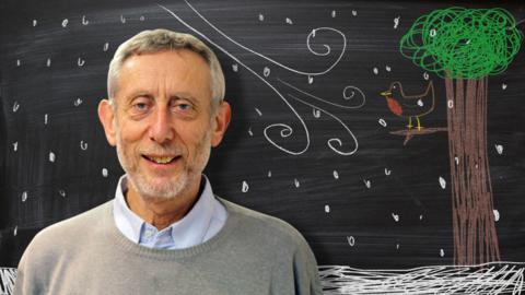 Michael Rosen from Poetry Playtime in front of a blackboard picture of a robin in the snow.