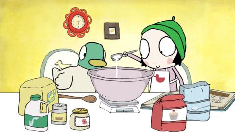 Sarah and Duck measuring cake ingredients into a mixing bowl.