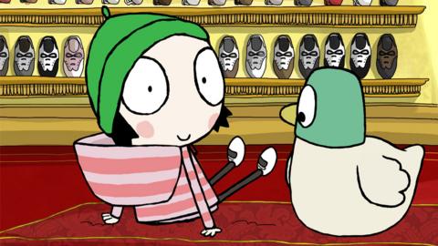 Sarah and Duck trying on Shoes.