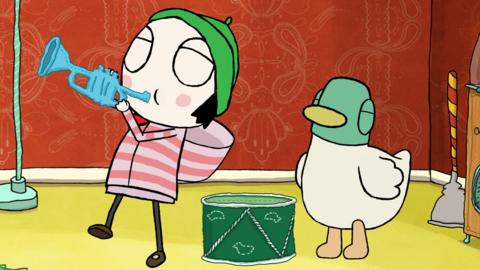 Scarf Lady, Sarah and Duck playing Woollen Musical Instruments.