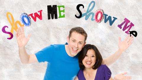 Chris and Pui with the Show Me Show Me logo.