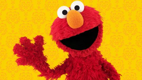 Elmo waving.