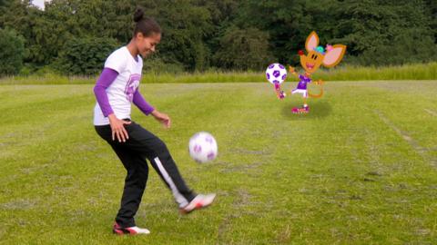 Rachel learning the keepy uppies skill.