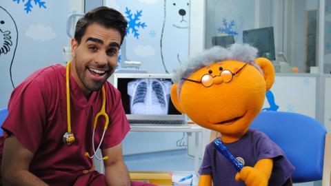 Dr Ranj next to a chest X-Ray image