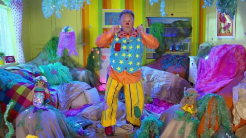 Mr Tumble has some adventures inside his home.