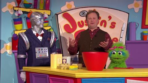 Justin, Robert and Little Monster cooking in the kitchen