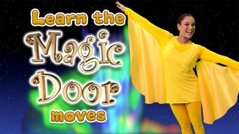 Cat wearing a flowing yellow costume.