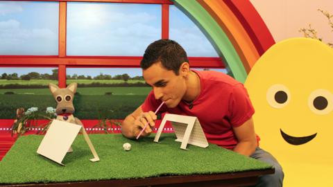 Ben playing blow football