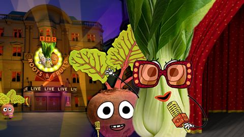 Theatre stage with a beetroot outside of a building lit up with text reading LIVE. Pak Choi is holding a microphone.