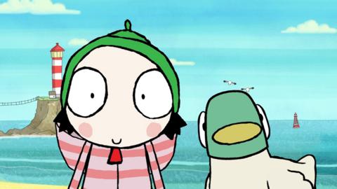 Sarah and Duck on a beach