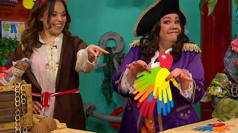 Click to watch how to make a paper parrot with CBeebies House and Swashbuckle.