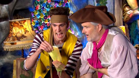 The pirates are looking at a paper