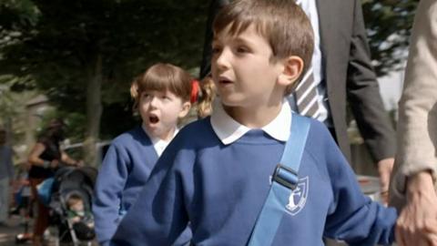 Topsy and Tim arrive for their first day of school.