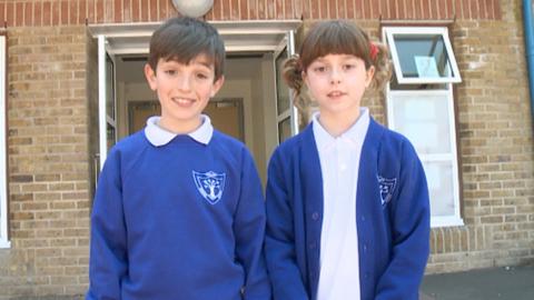 Topsy and Tim outside school