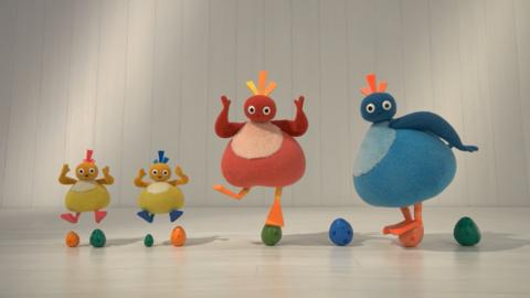 Twirlywoos balancing on colourful balls