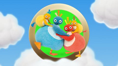 Twirlywoos on a sky blue background with clouds.