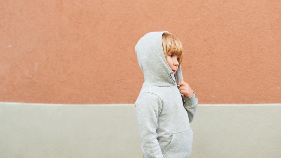 boy wearing hoodie