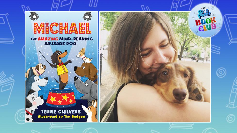 A woman is cuddling her sausage dog, next to her is the cover for her book 'Michael the Amazing Mind-Reading Sausage Dog' which shows a cartoon sausage dog on a circus podium.