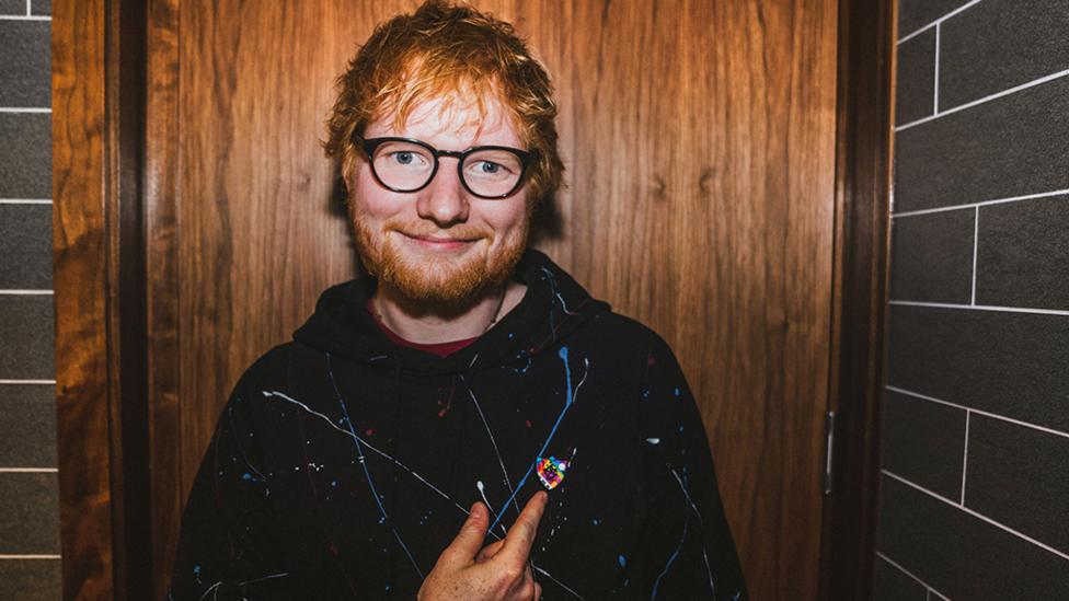 Ed Sheeran with the all new Music badge.