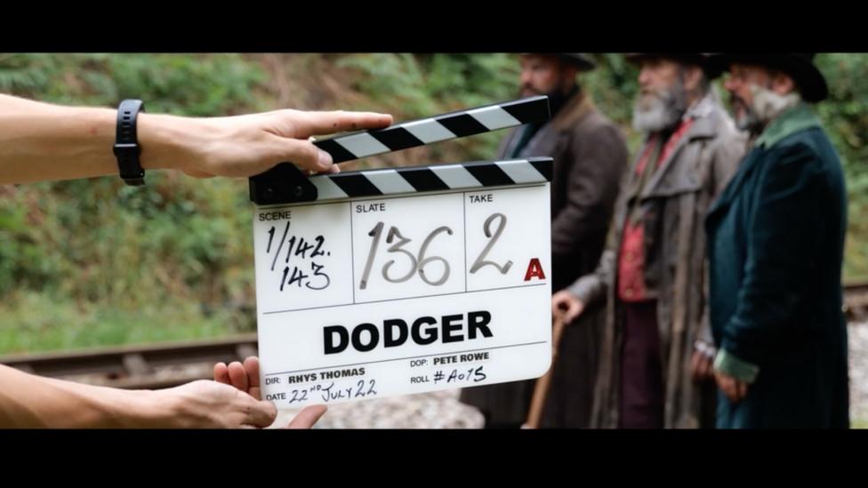A clapperboard behind the scenes on Dodger, as filming begins.