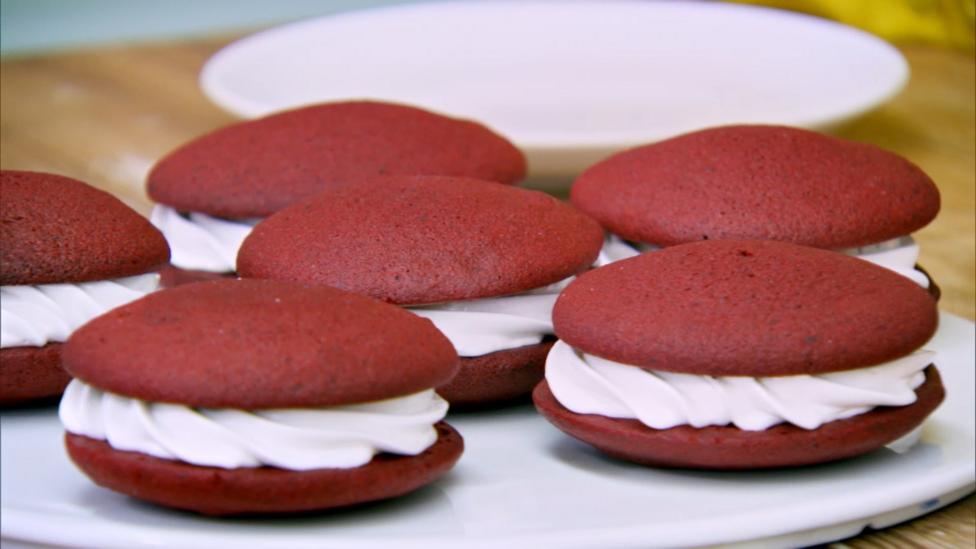 Red whoopie pies filled with marshmallow cream.