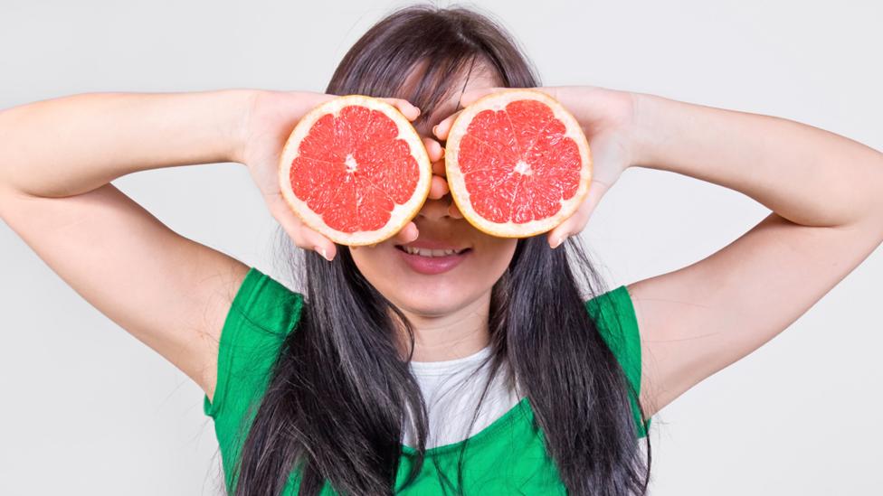 Girl with grapefruit eyes