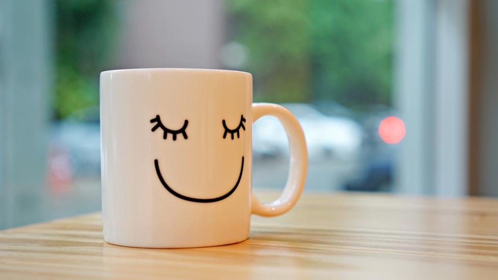 A mug with a smiley face