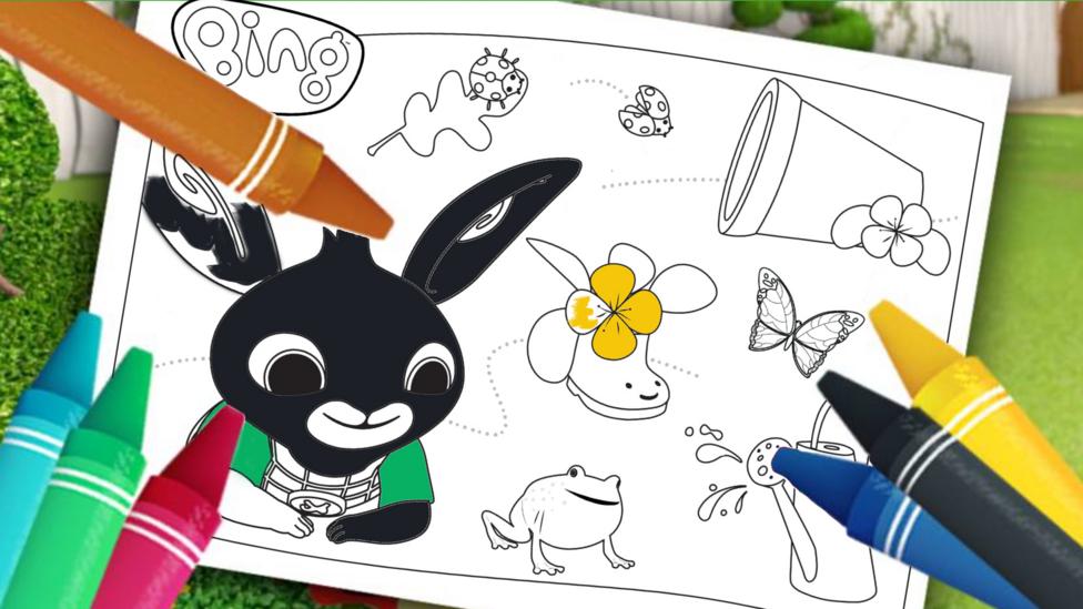 Bing is on a colouring sheet, half coloured in, along with other spring items. Colouring pencils surround the page.