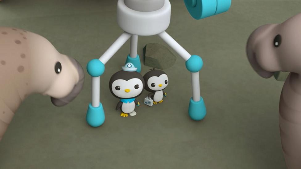 Octo-agents Pinto and Peso surrounded by sea lions.