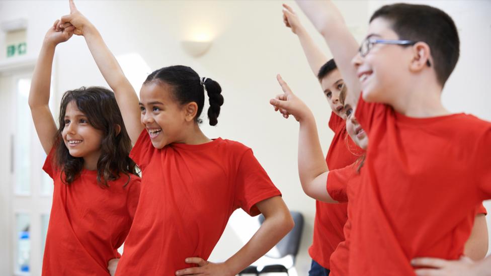 Children performing in a group