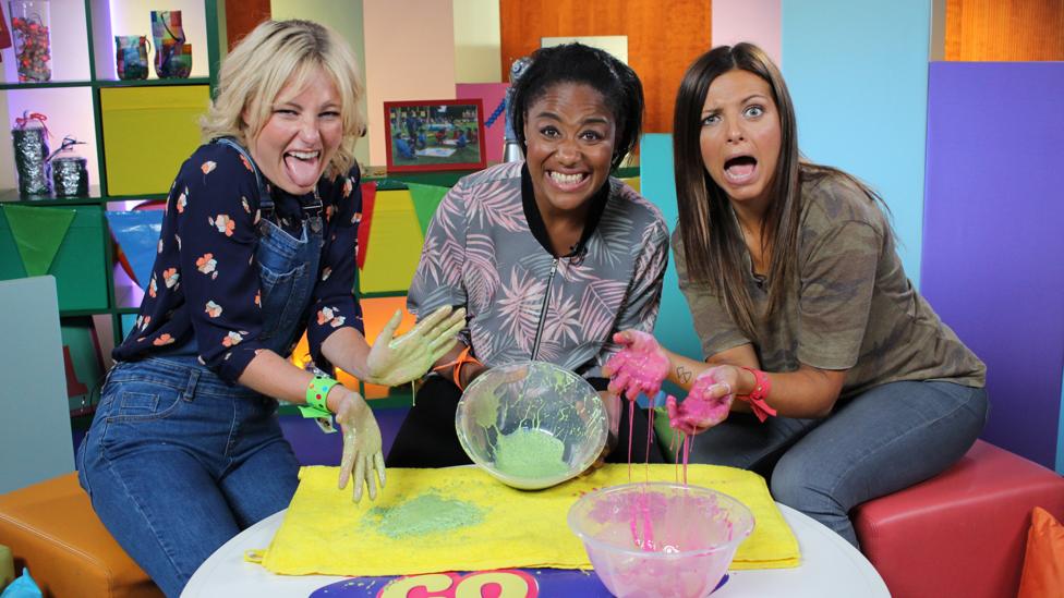 Kirsten, Joanna and Lizzie hold slime