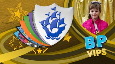 A Blue Peter VIP, Abigail, smiles against a glittery gold background, she is wearing a pink puffer jacket, has long brown hair and is a young girl.
