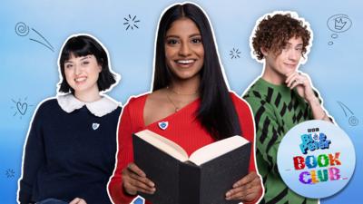 In the centre of the image, Blue Peter presenter Shini is holding a book and smiling. To her right is Joel and on her left is Abby. There is a small sticker in the corner that reads 'Blue Peter Book Club'.