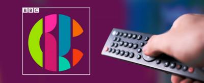 A TV remote and the CBBC logo.