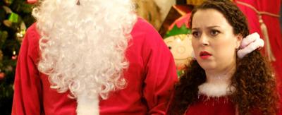 Tracy dressed up as Mrs Claus in The Dumping Ground, looking shocked