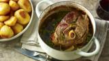 Slow roast leg of lamb with chardonnay, rosemary, sage and bay