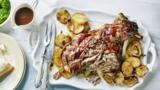 Slow roast shoulder of lamb with sliced potatoes