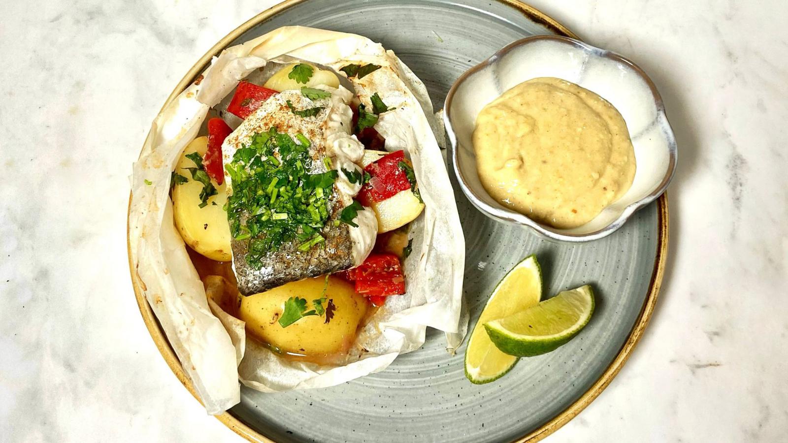 Baked hake with roasted red peppers and potatoes recipe - BBC Food