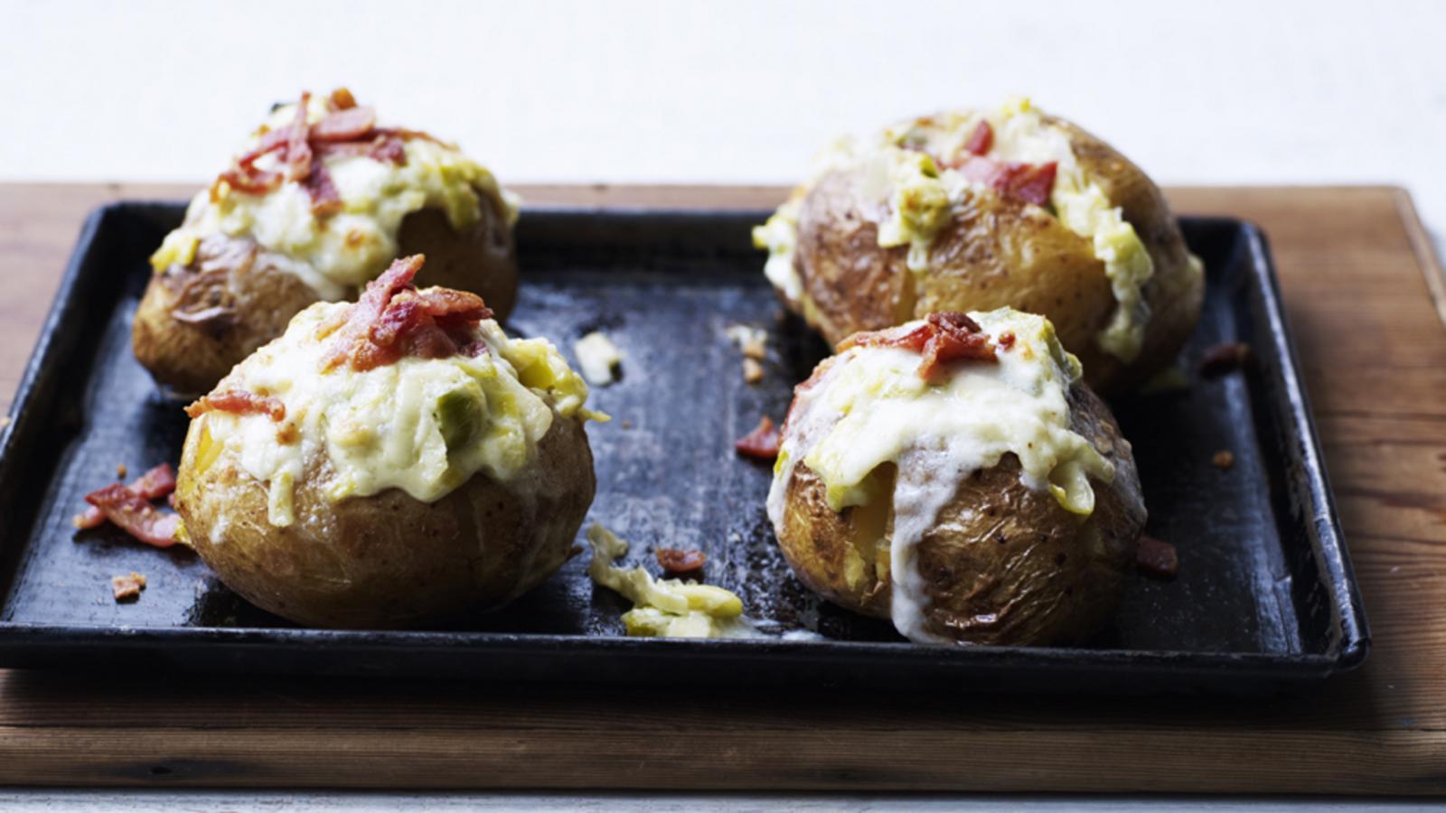 Baked potato with bacon, taleggio and leek