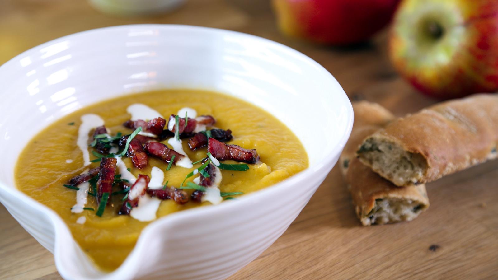 Celeriac and apple soup with bacon and parsley