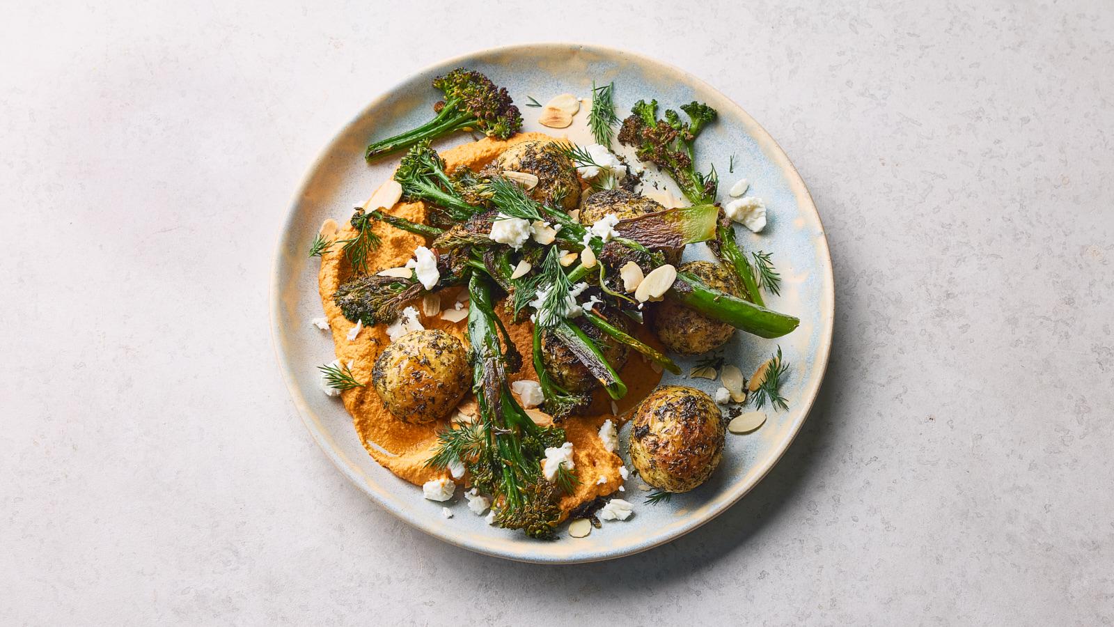 Charred purple sprouting broccoli with romesco whipped tofu