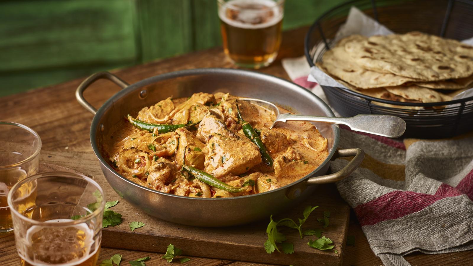 Chicken tikka masala with chapatis and pilau rice