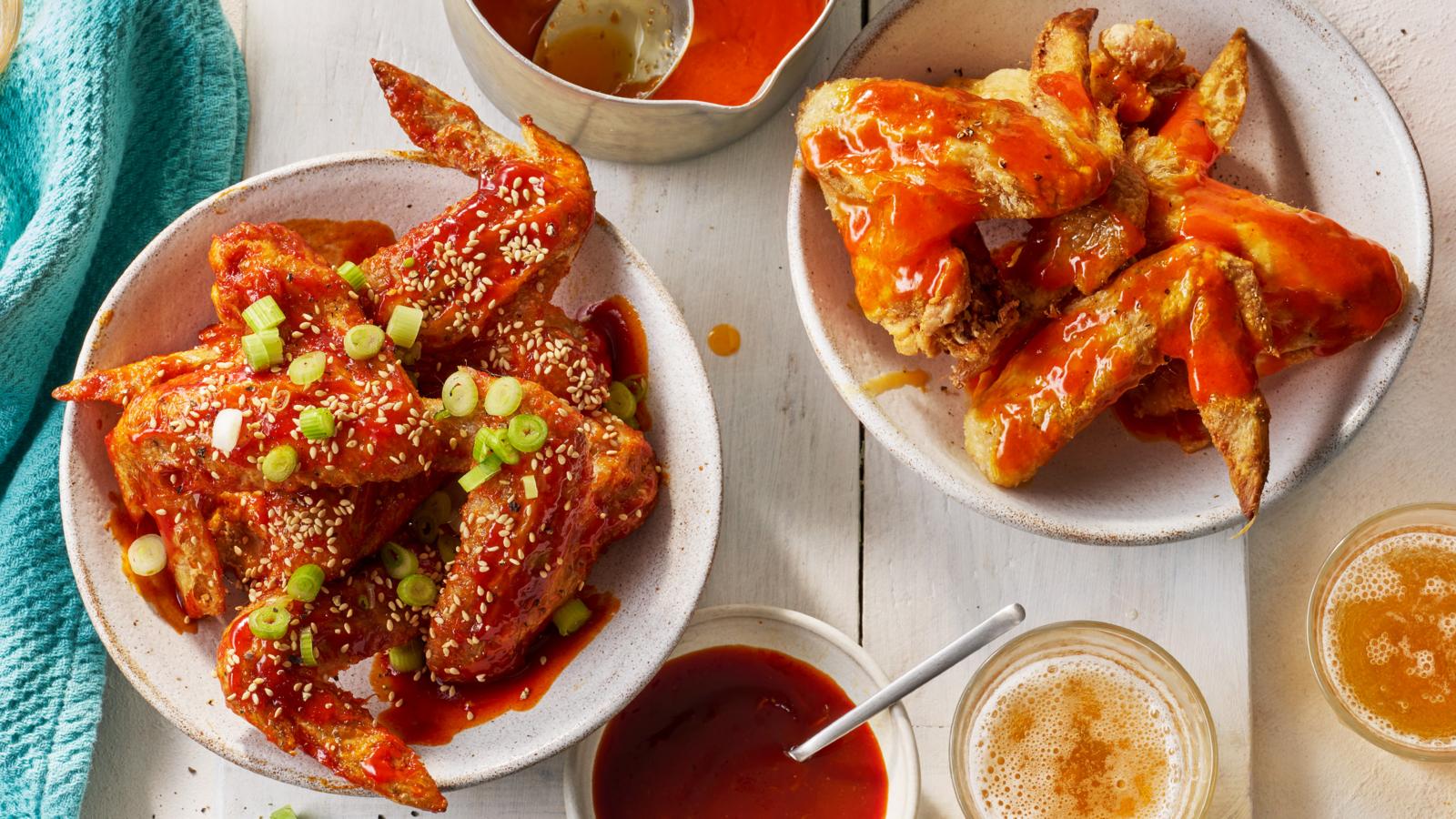 Crispy baked chicken wings with Korean barbecue and buffalo sauce