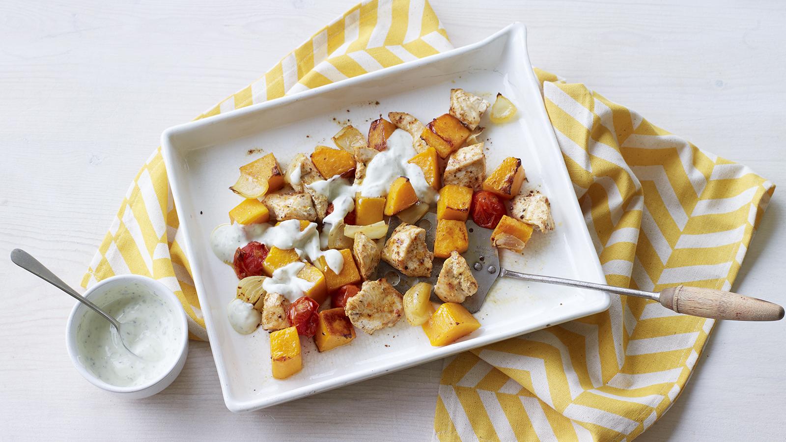 Chicken with butternut squash, cherry tomatoes and minty yoghurt dressing